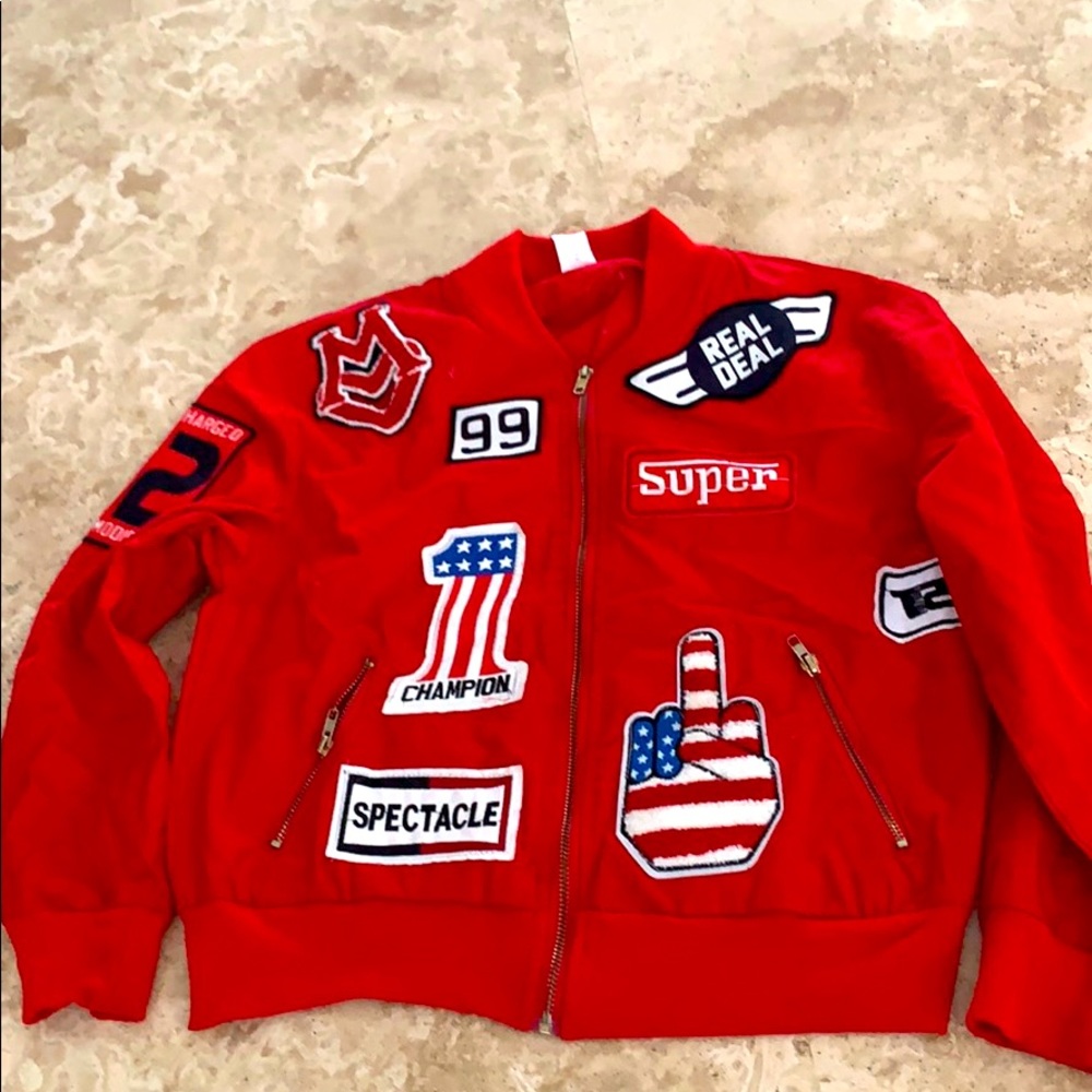 Red jacket with signs. Size L (runs small like M)
